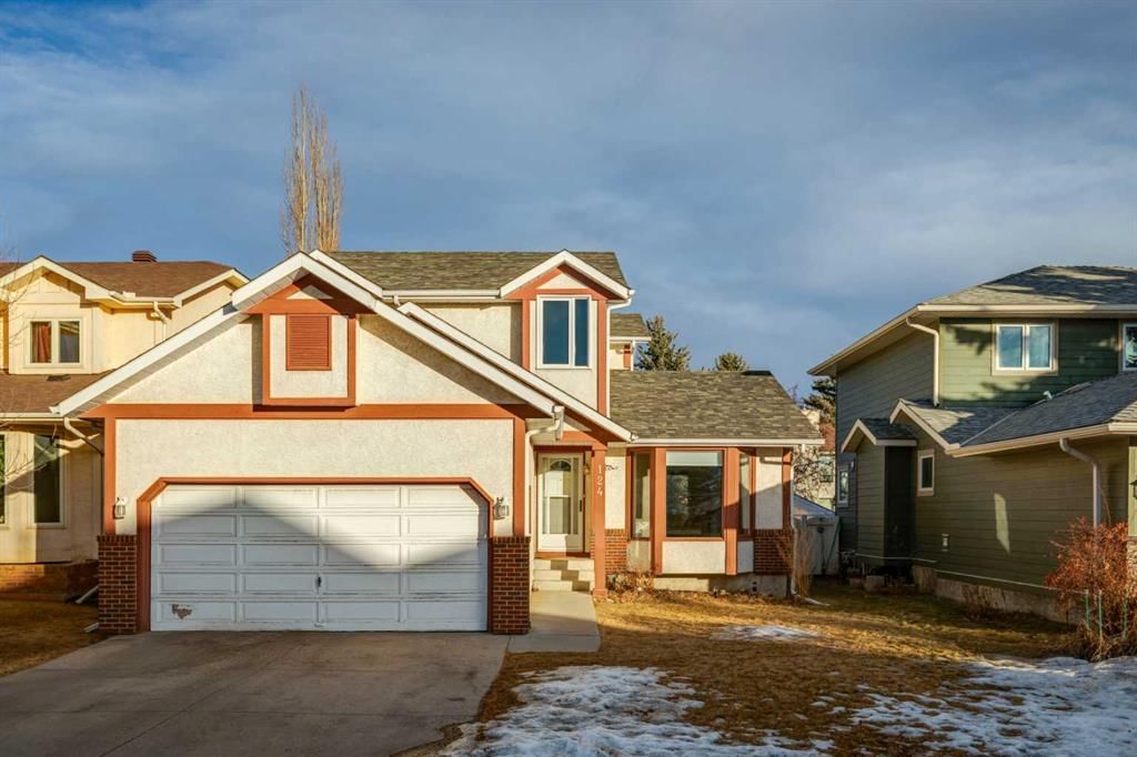 124 Woodmark Crescent SW, Calgary — main listing photo