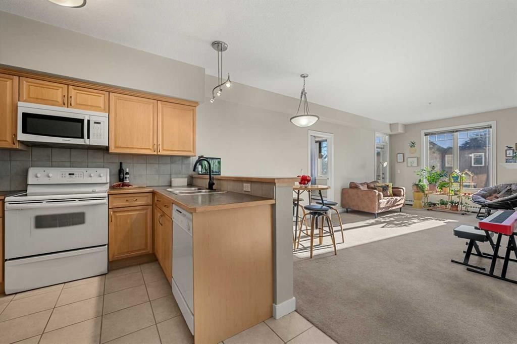 2207, 1888 Signature Park SW, Calgary — photo 3 of 41
