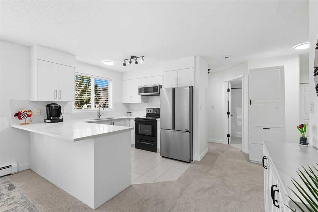 1211, 7451 Springbank Boulevard SW, Calgary — photo 2 of 34