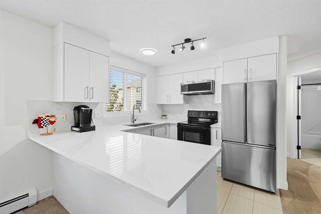 1211, 7451 Springbank Boulevard SW, Calgary — photo 3 of 34