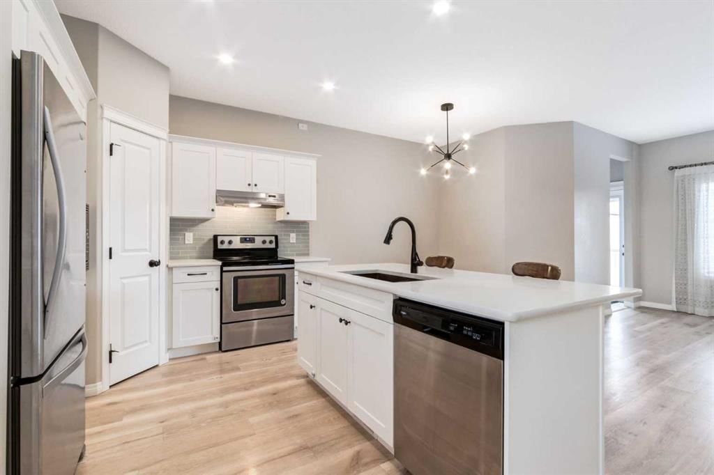 730 Belmont Drive SW, Calgary — photo 3 of 35