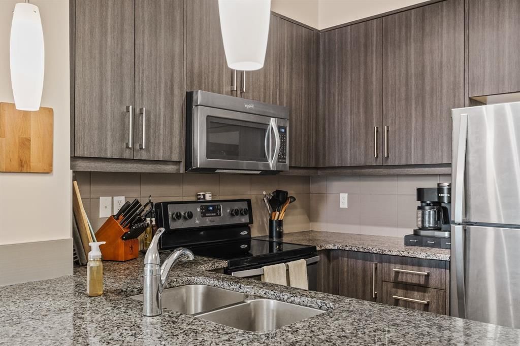 305, 402 Marquis Lane SE, Calgary — photo 3 of 32