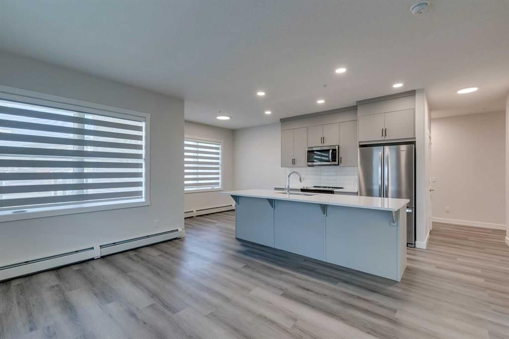 113, 55 Wolf Hollow Crescent SE, Calgary — photo 2 of 32