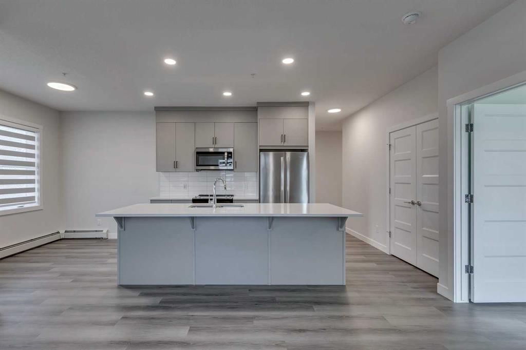 113, 55 Wolf Hollow Crescent SE, Calgary — photo 3 of 32