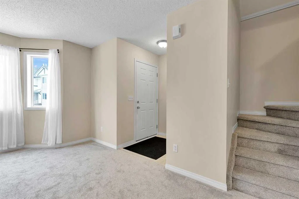 34 Royal Birch Villas NW, Calgary — photo 4 of 38