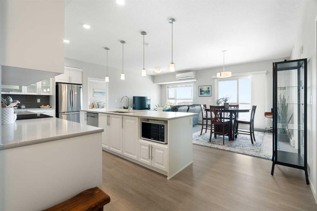 410, 4250 Seton Drive SE, Calgary — photo 2 of 36