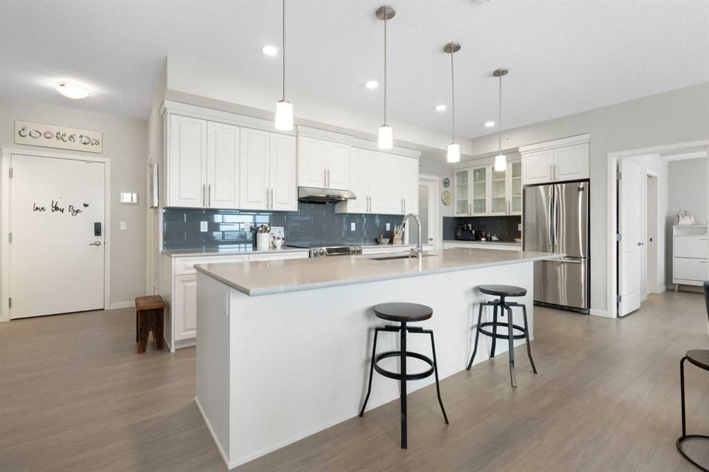 410, 4250 Seton Drive SE, Calgary — photo 4 of 36