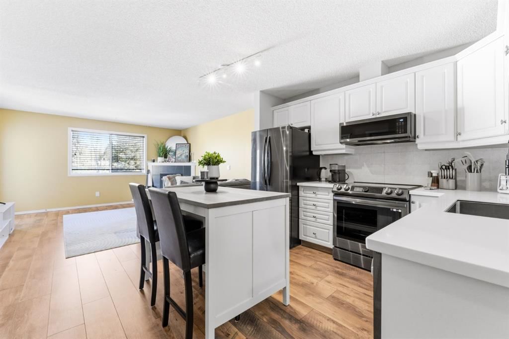 203, 6148 Bowness Road NW, Calgary — main listing photo