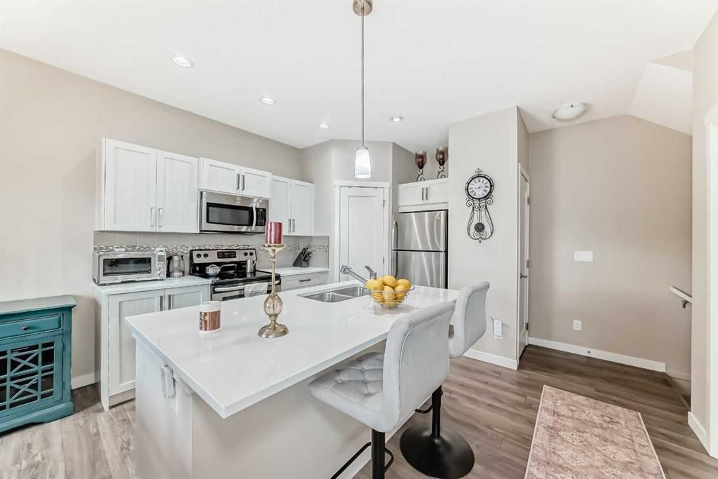 303, 428 Nolan Hill Drive NW, Calgary — main listing photo