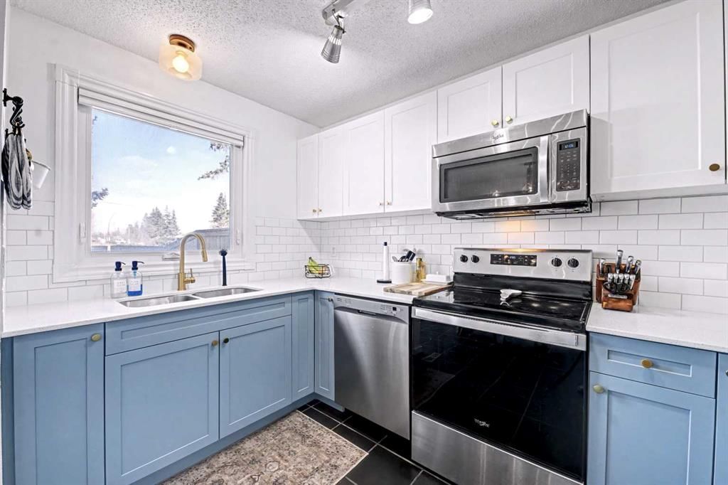180, 123 Queensland Drive SE, Calgary — main listing photo