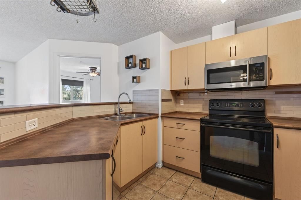 2317, 10 Prestwick Bay SE, Calgary — photo 5 of 27