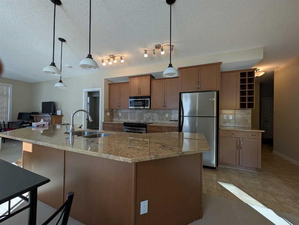 203, 35 Aspenmont Heights SW, Calgary — photo 4 of 24