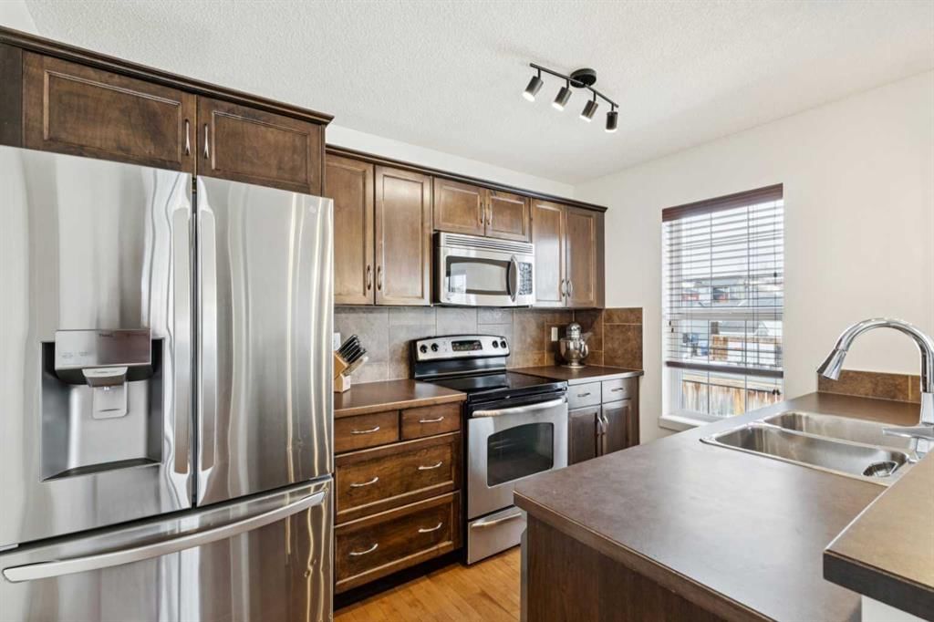 344 Silverado Drive SW, Calgary — photo 4 of 32