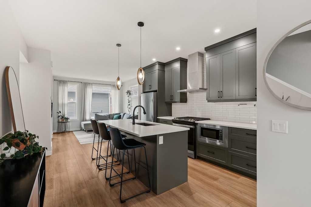 168 Rowmont Boulevard NW, Calgary — photo 3 of 35