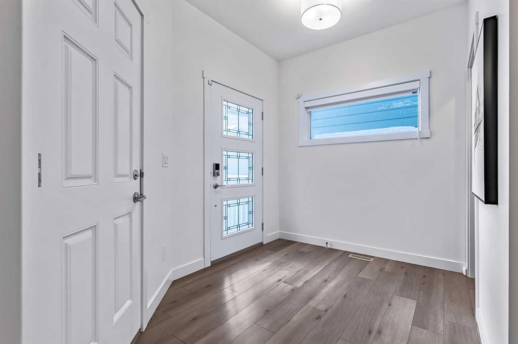 882 Bluerock Way SW, Calgary — photo 3 of 35