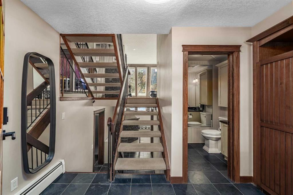 13, 828 Coach Bluff Crescent SW, Calgary — photo 5 of 42