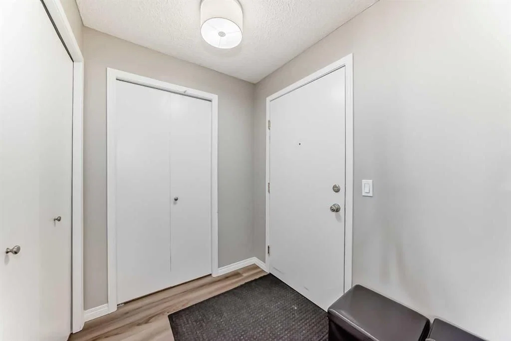 6310, 304 Mackenzie Way SW, Airdrie — photo 4 of 33