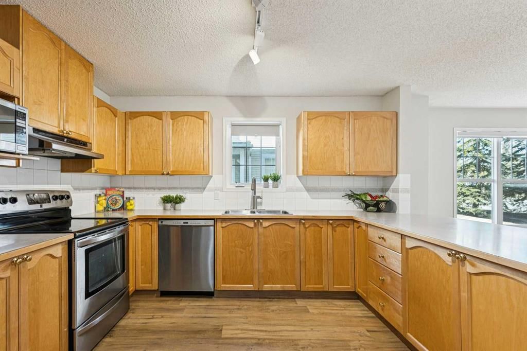 704, 7171 Coach Hill Road SW, Calgary — photo 4 of 24
