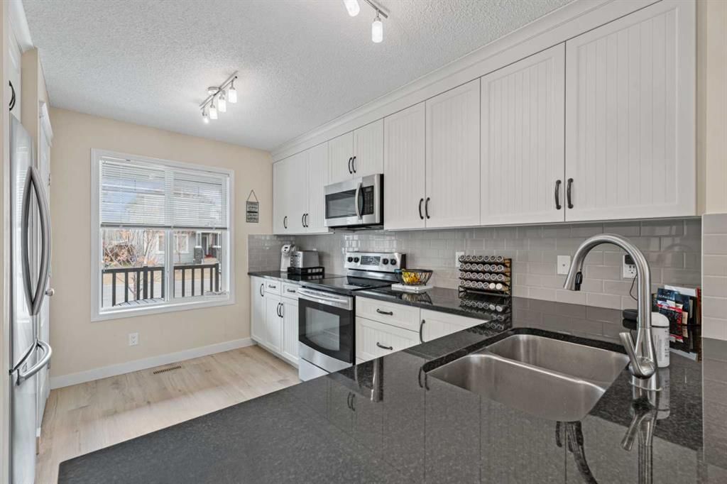 216 Copperpond Parade SE, Calgary — photo 4 of 44