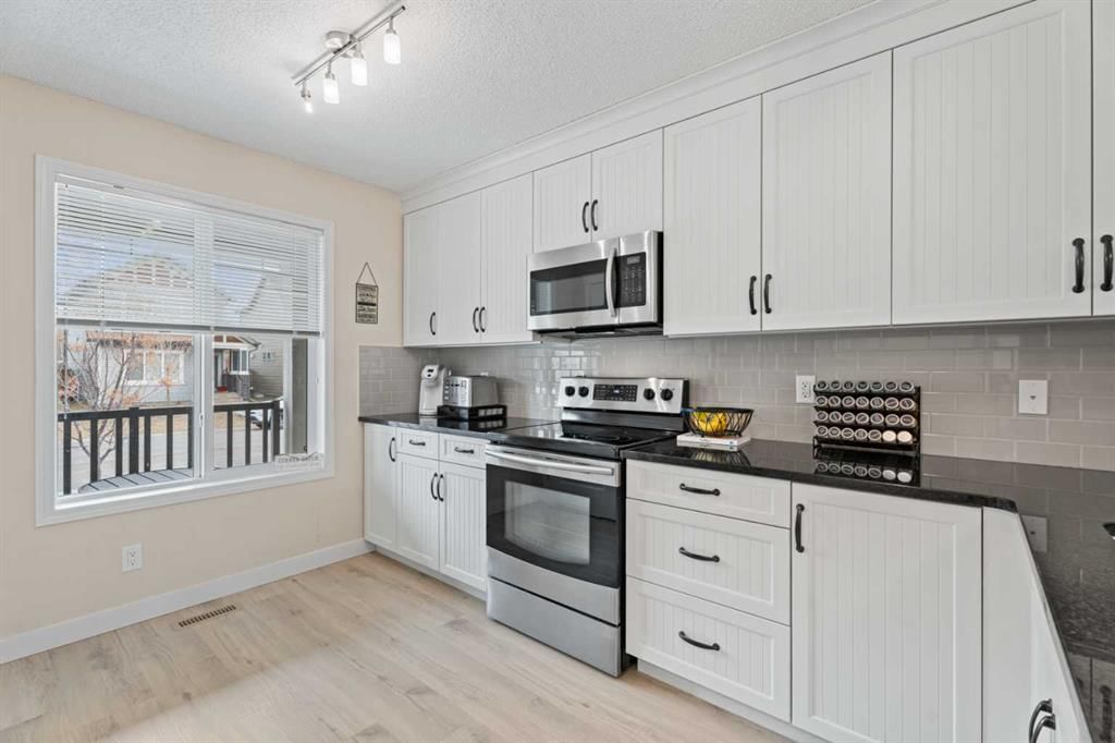 216 Copperpond Parade SE, Calgary — photo 5 of 44
