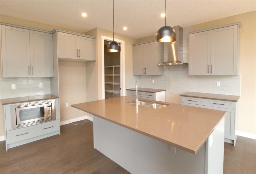 115 Sundown Crescent, Cochrane — photo 5 of 25