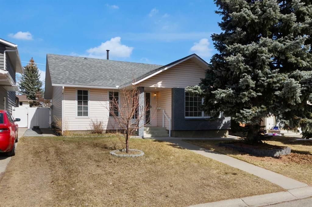 11 Woodfield Crescent SW, Calgary — main listing photo