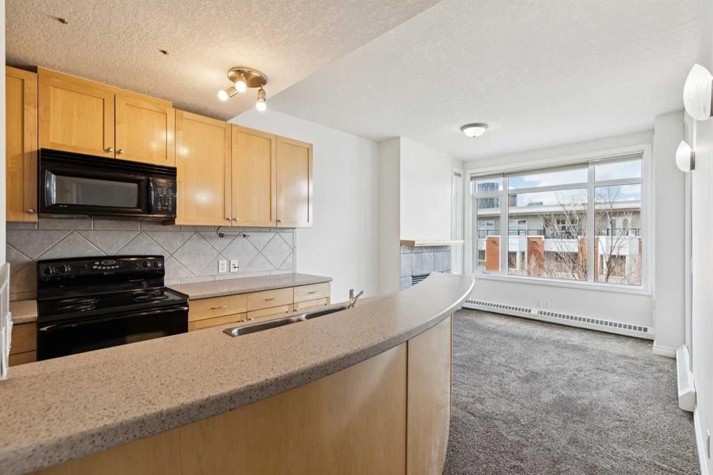 425, 910 Centre Avenue NE, Calgary — photo 4 of 37