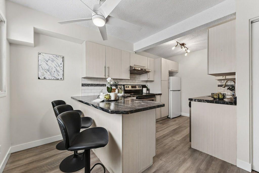 3, 6100 4 Avenue NE, Calgary — photo 4 of 30