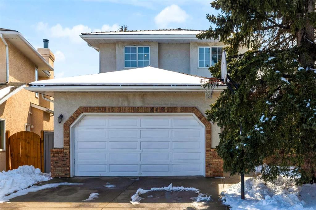 220 Woodbrook Mews SW, Calgary — main listing photo
