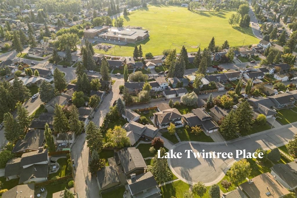 16 Lake Twintree Place SE, Calgary — photo 3 of 50