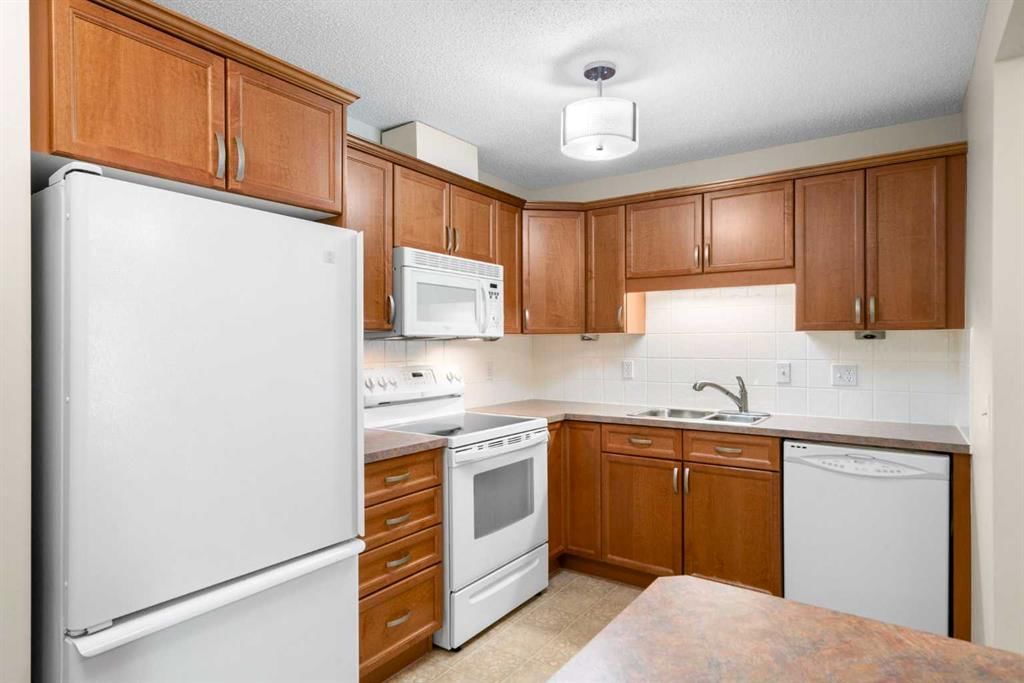 2102, 928 Arbour Lake Road NW, Calgary — photo 3 of 23