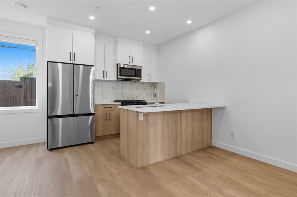 1224 20 Avenue NW, Calgary — photo 4 of 50