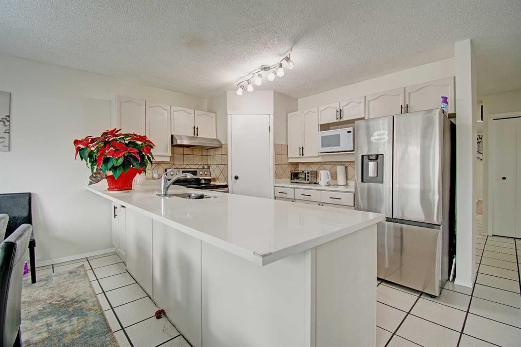 10316 Hidden Valley Drive NW, Calgary — main listing photo