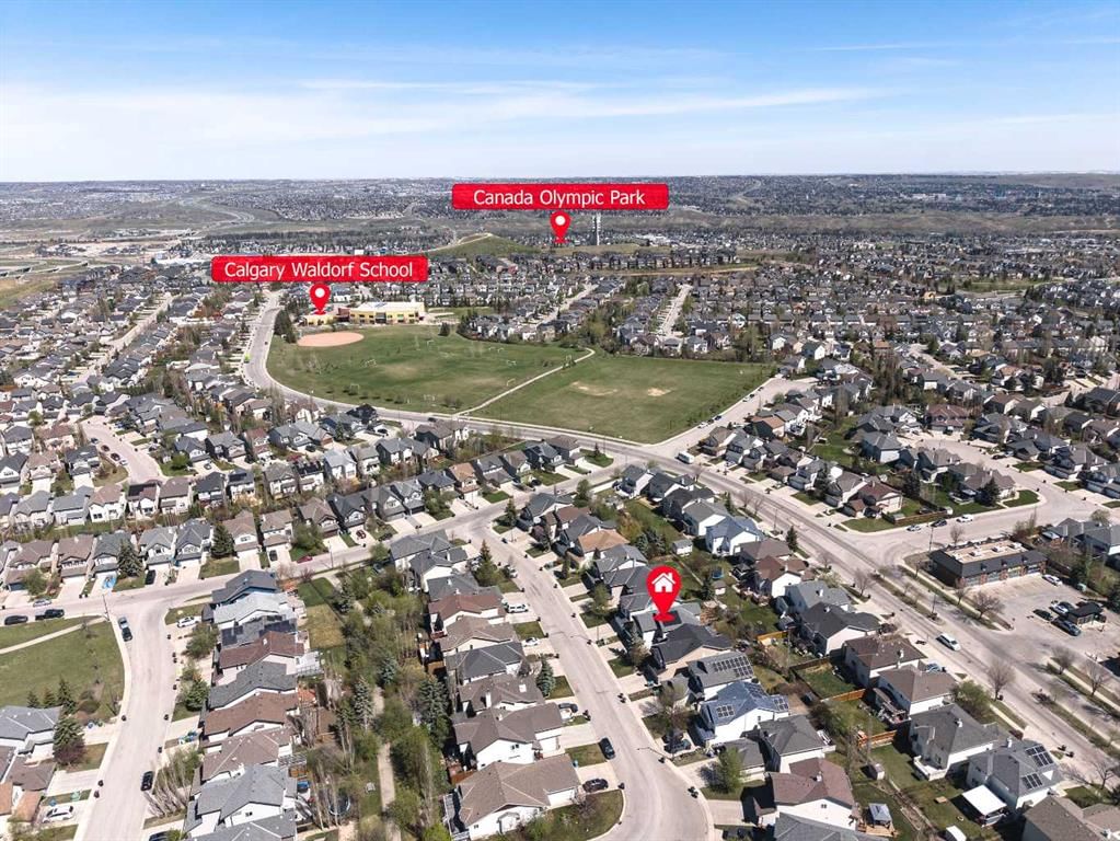 32 Cougarstone Square SW, Calgary — photo 3 of 35
