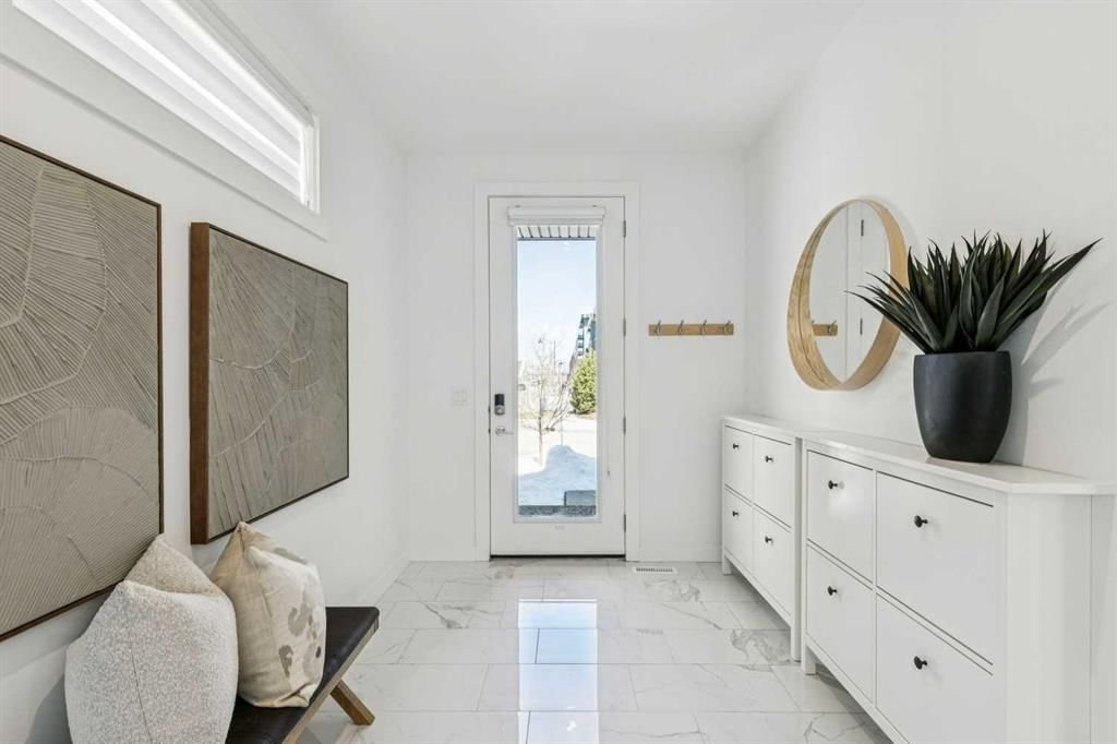 7877 8A Avenue SW, Calgary — photo 3 of 48