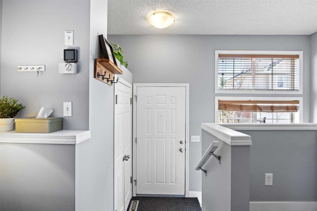 3065 New Brighton Gardens SE, Calgary — photo 3 of 33