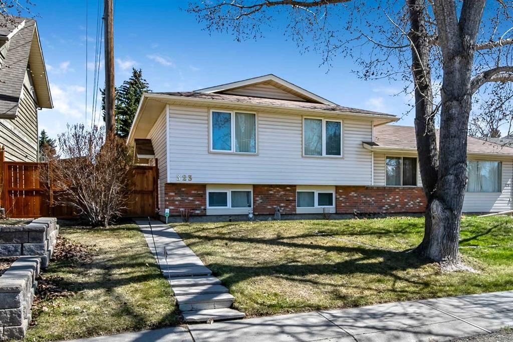 323 Woodvale Crescent SW, Calgary — main listing photo