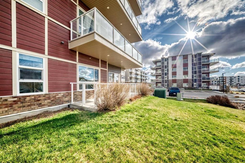 103, 300 Harvest Hills Place NE, Calgary — main listing photo