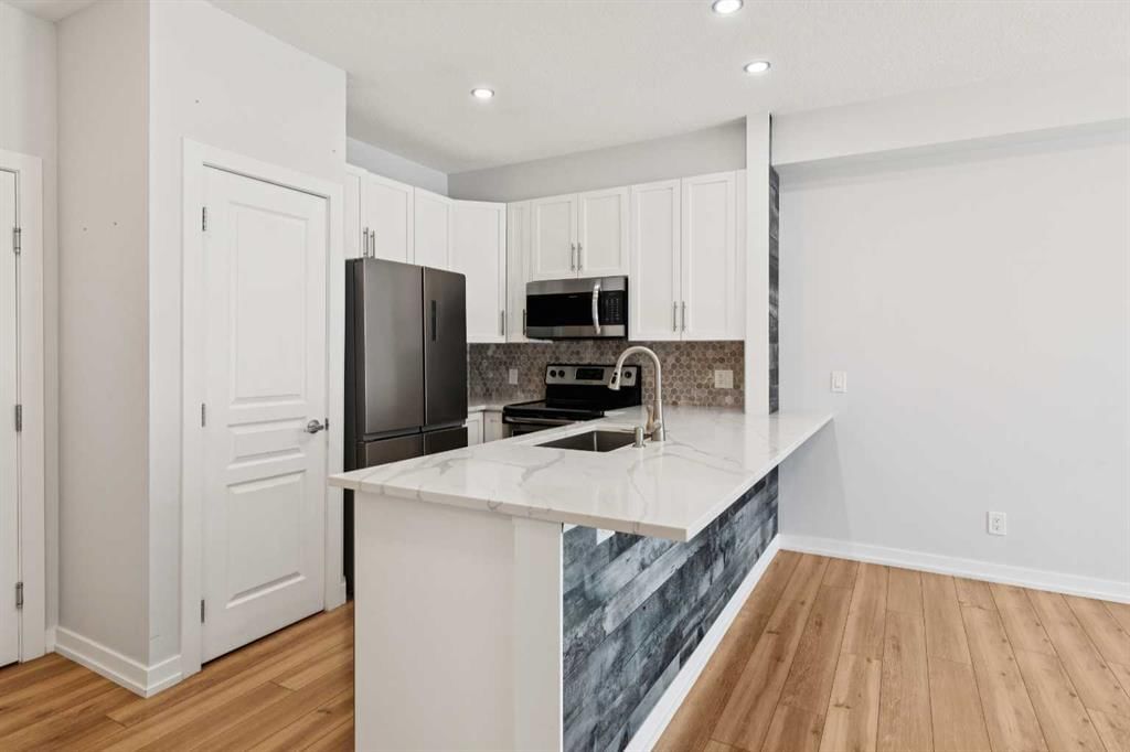 112, 10 Panatella Road NW, Calgary — photo 5 of 35