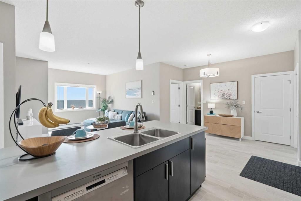 327, 11 Millrise Drive SW, Calgary — main listing photo