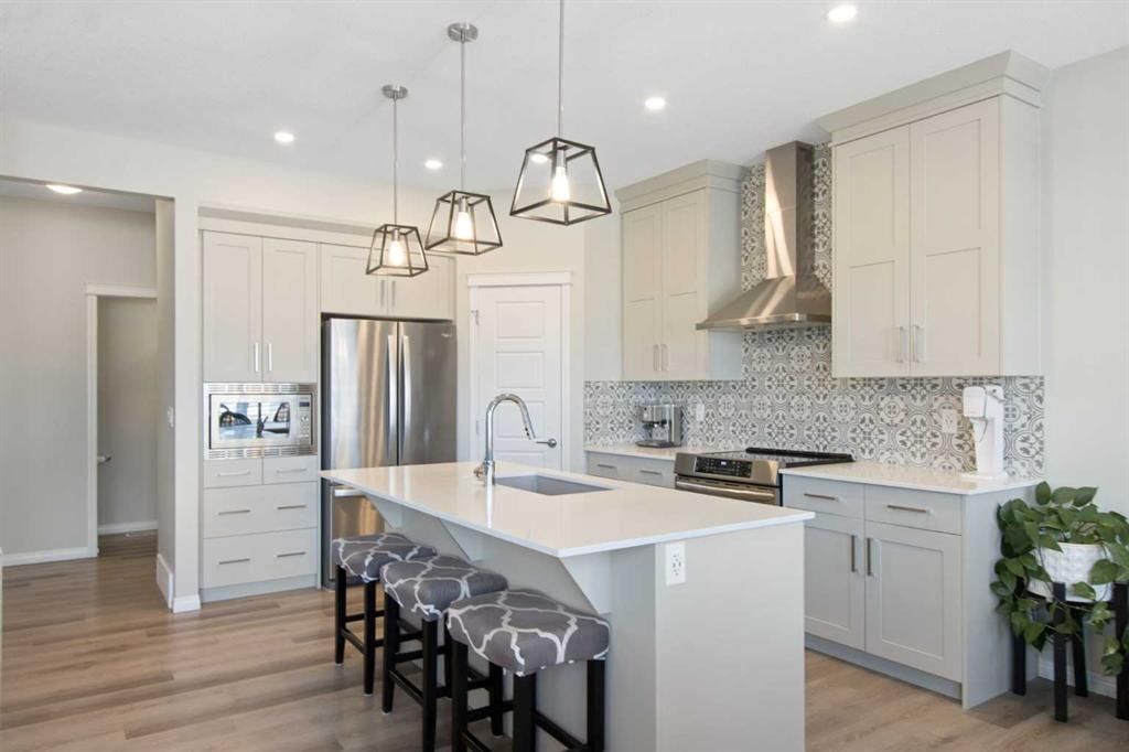 32 Wolf Creek Street SE, Calgary — photo 4 of 46