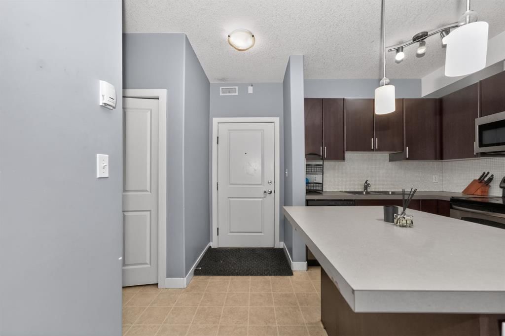 338, 23 Millrise Drive SW, Calgary — photo 3 of 22