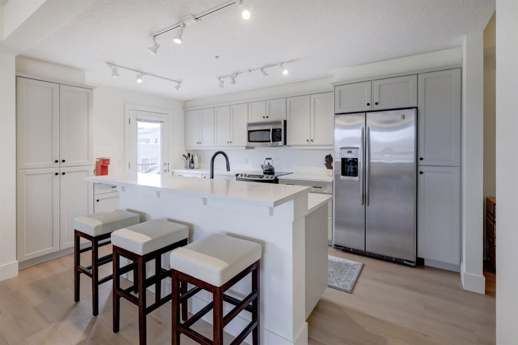 2210, 10221 Tuscany Boulevard NW, Calgary — main listing photo