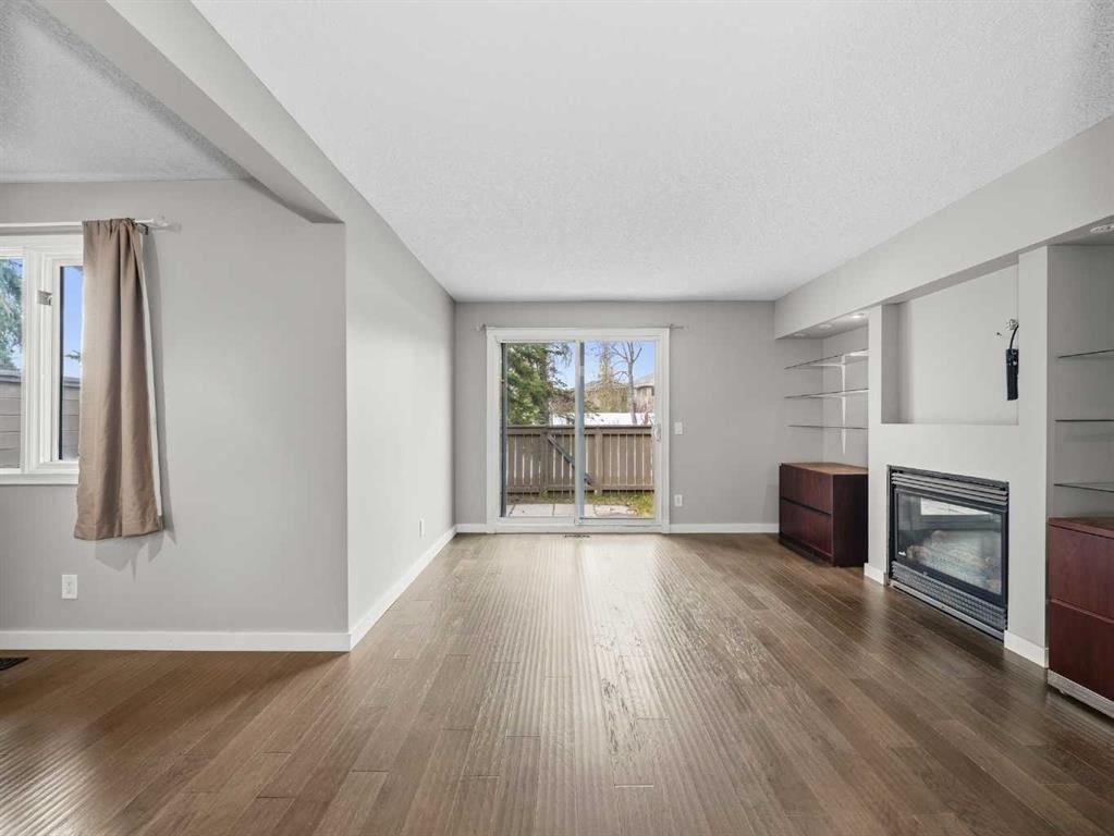 202, 829 Coach Bluff Crescent SW, Calgary — main listing photo