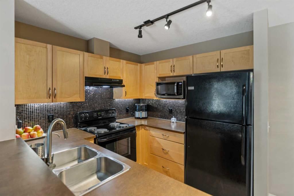2218, 115 Prestwick Villas SE, Calgary — photo 4 of 36