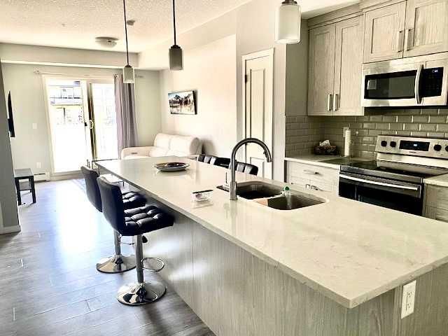 217, 4350 Seton Drive SE, Calgary — photo 2 of 21