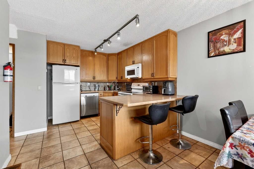 46, 4769 Hubalta Road SE, Calgary — photo 3 of 38