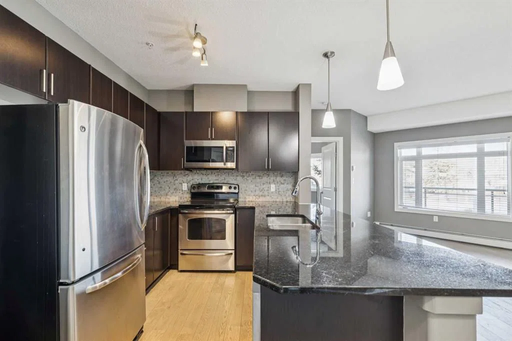 309, 23 Millrise Drive SW, Calgary — photo 5 of 33