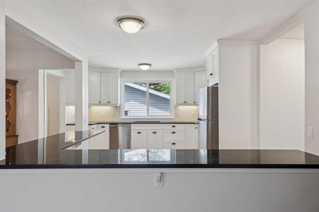 12223 Canfield Road SW, Calgary — photo 5 of 23