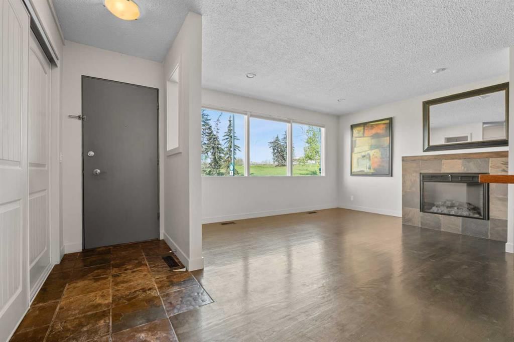 2420 Langriville Drive SW, Calgary — photo 4 of 48